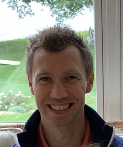 Peter Duveneck, Senior Manager on the Technology Platform Team, smiling in a collared shirt